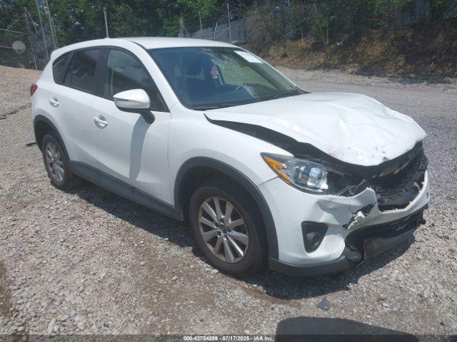  Salvage Mazda Cx